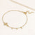 "Serenity" 0.9CTW Bezel Set Cross and Charms Bracelet - Sterling Silver / Gold Vermeil