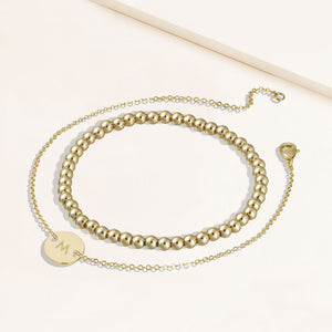 "One and Only" Set of Two Initial Disc & Stretch Polished Beads Layering Bracelets