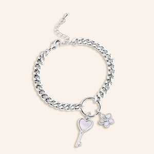 "The Start of a New Beginning" Multi Charm Curb Chain Bracelet - Flower & Key Charms