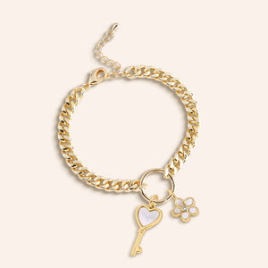 "The Start of a New Beginning" Multi Charm Curb Chain Bracelet - Flower & Key Charms
