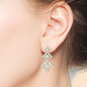 "Hierarchy Delight" 5.1CTW Baguette Graduated Diamond Shape Dangling Earrings
