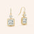 "Stunning Dangles" 6.5CTW Princess Cut Dangle Earrings