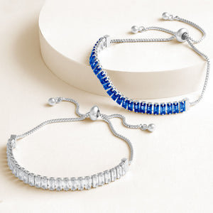"Stellar Duo" 12.5CTW Clear & Blue Sapphire Baguette Cut Tennis Pull-Tie Bracelet Set - Silver