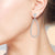 "Main Attraction" 3.5CTW Pear Cut Drop Earrings