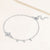 "Serenity" 0.9CTW Bezel Set Cross and Charms Bracelet - Sterling Silver / Gold Vermeil
